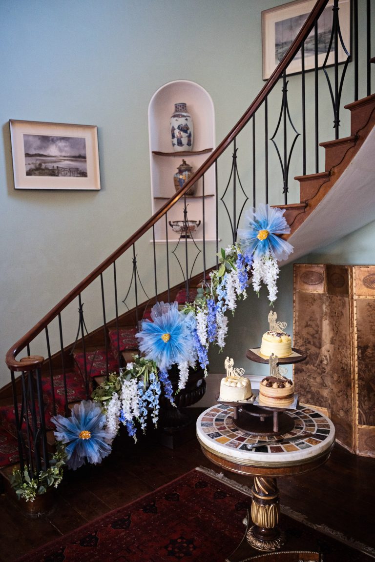 A stunning georgian staircase plus a three tiered wedding cake